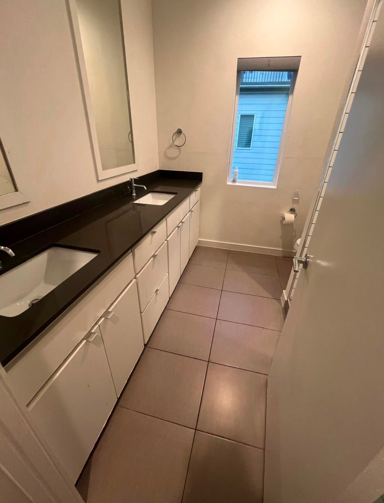 Freshly cleaned bathroom vanity and floor