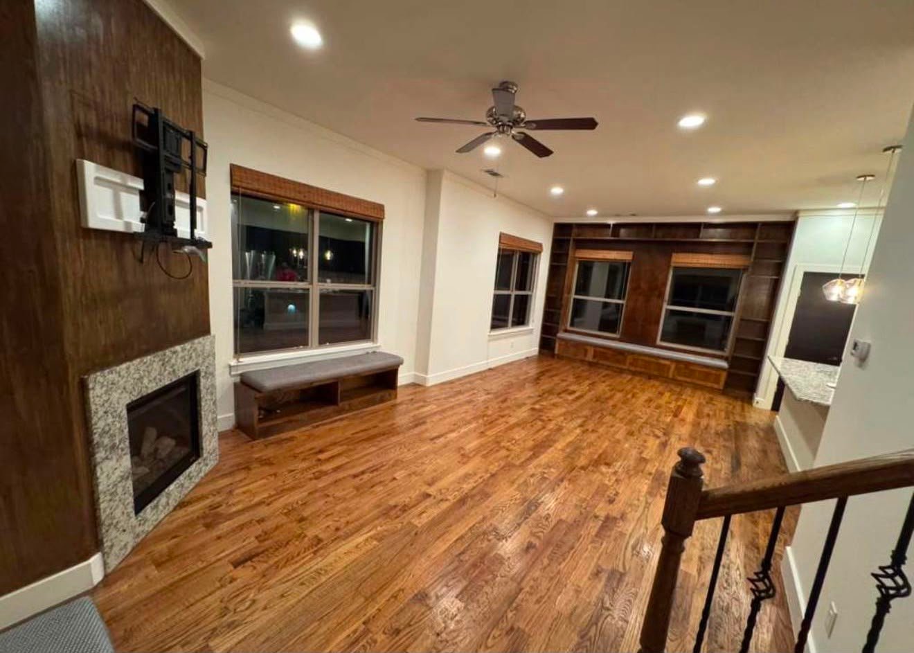 Clean living room with polished hardwood floors